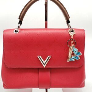 Authentic Louis Vuitton Lock & Key W/ Unbranded Elegant Blue Butterfly Keychain